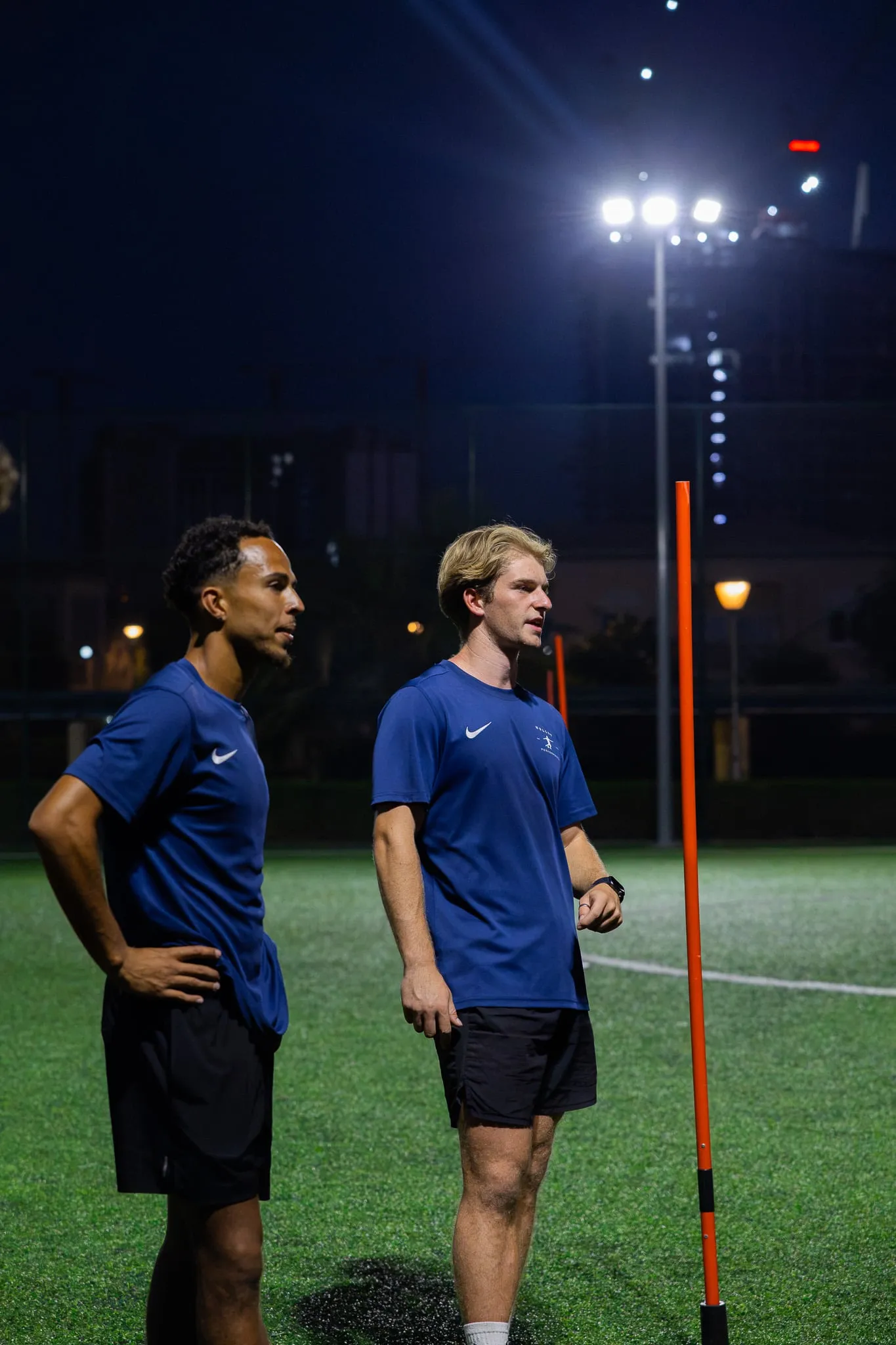 Hulley Performance coaches under the floodlights at an evening session in Dubai